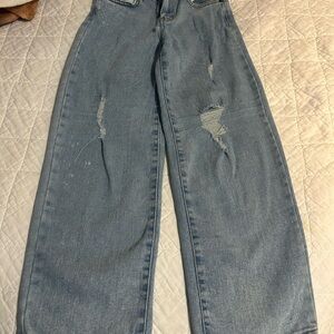 Distressed Blue Jeans